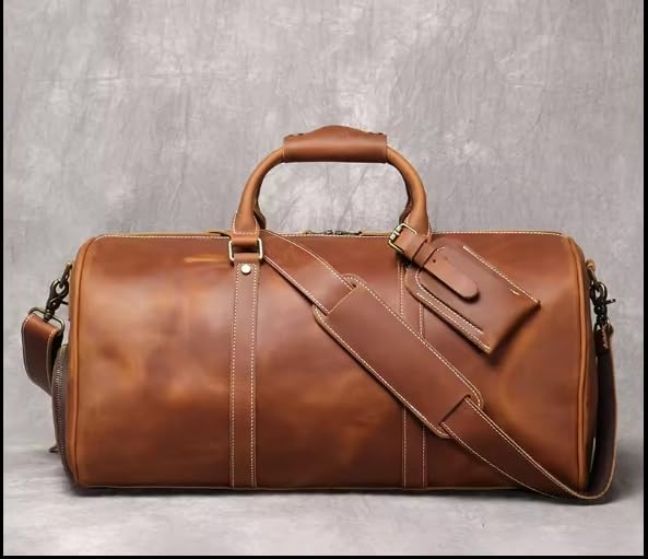Mullis Mercantile Leather Weekender Travel Bag, a timeless classic. This vintage leather duffle bag is perfect for airline carry on, full-grain leather, a retro design, gym, and a YKK zipper in brown.