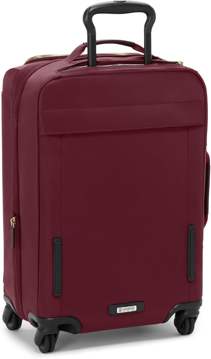 TUMI - Voyageur Leger 4 Wheeled Luggage - Women's Lightweight and Spacious, Sleek Silhouette, Durable Premium Suitcase - 21.8" International Expandable Carry-On, Wine