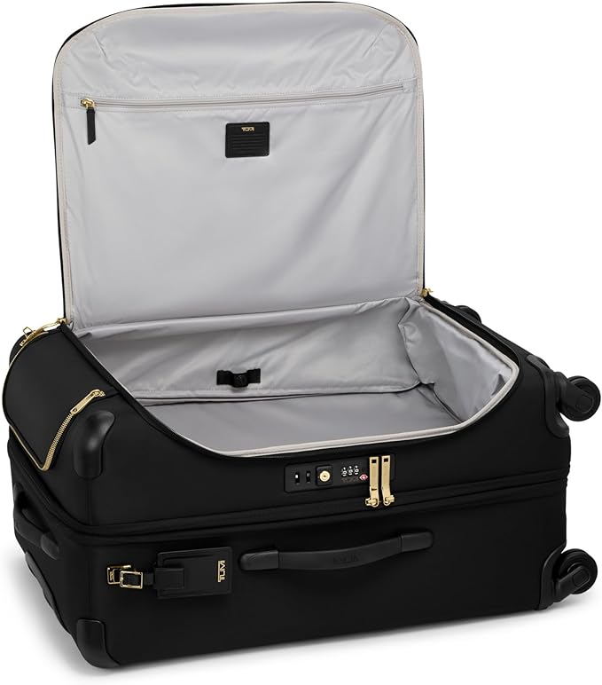 TUMI - Voyageur Leger 4 Wheeled Luggage - Women's Lightweight and Spacious, Sleek Silhouette, Durable Premium Suitcase - 29" Extended Trip Expandable Packing Case, Black with Gold Hardware