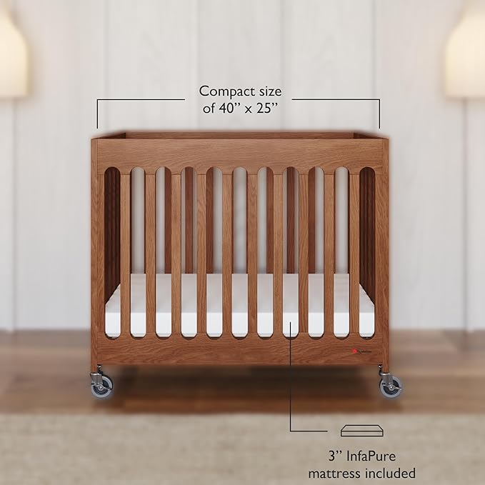 Foundations Boutique Folding Mini Baby Crib - Compact, Portable, Wooden Hotel Crib, Foldable Mini Crib for Baby & Toddlers - Includes 3" Foam Mattress, Cherry