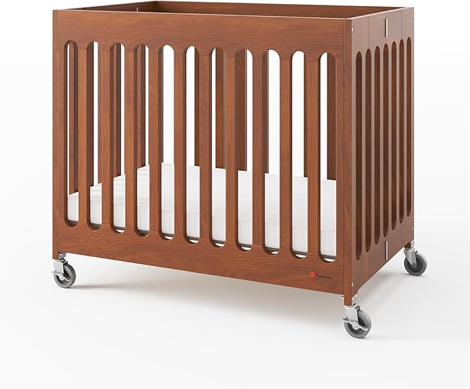 Foundations Boutique Folding Mini Baby Crib - Compact, Portable, Wooden Hotel Crib, Foldable Mini Crib for Baby & Toddlers - Includes 3" Foam Mattress, Cherry