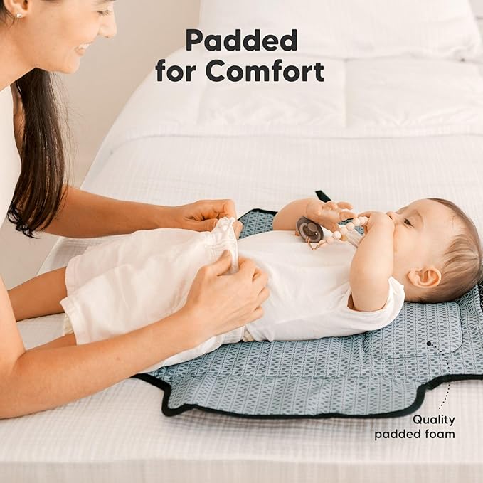 KeaBabies Portable Diaper Changing Pad - Large Waterproof Baby Changing Mat, Compact Travel Diaper Clutch, Functional Pockets Fit Newborn Essentials, Wipeable & Padded Baby Changer (Black Geo)