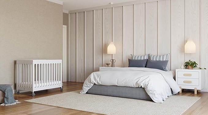 Foundations Boutique Folding Mini Baby Crib - Compact, Portable, Wooden Hotel Crib, Foldable Mini Crib for Baby & Toddlers - Includes 3" Foam Mattress, White
