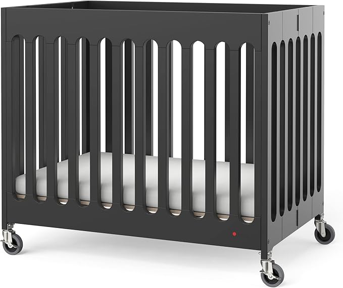 Foundations Boutique Folding Mini Baby Crib - Compact, Portable, Wooden Hotel Crib, Foldable Mini Crib for Baby & Toddlers - Includes 3" Foam Mattress, Ebony