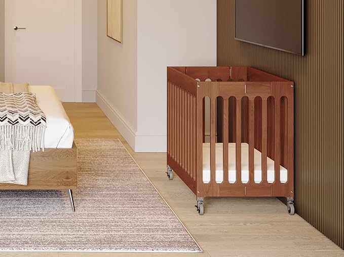 Foundations Boutique Folding Mini Baby Crib - Compact, Portable, Wooden Hotel Crib, Foldable Mini Crib for Baby & Toddlers - Includes 3" Foam Mattress, Cherry