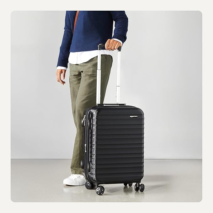Amazon Basics 21" Hardside Carry-On Luggage, Hardshell Suitcase With Wheels, Expandable For Up to 25% More Space, With Scratch-Resistant Surface, Four Multi-directional Wheels, Black