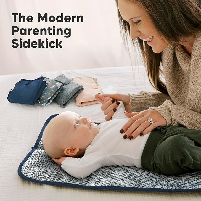 KeaBabies Portable Diaper Changing Pad, Easy Wipe Clean - Foldable Waterproof Baby Changing Mat for Diaper Bag, Compact, Lightweight, 25x13 Baby Changer Travel Essential, Machine Washable (Navy Blue)