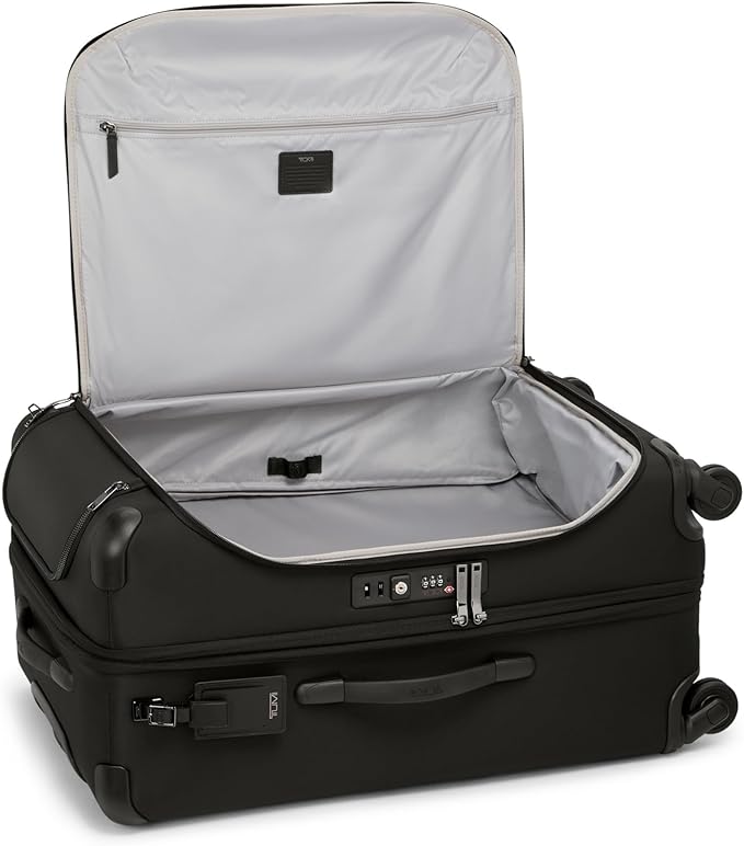 TUMI - Voyageur Leger 4 Wheeled Luggage - Women's Lightweight and Spacious, Sleek Silhouette, Durable Premium Suitcase - 29" Extended Trip Expandable Packing Case, Black with Gunmetal Hardware