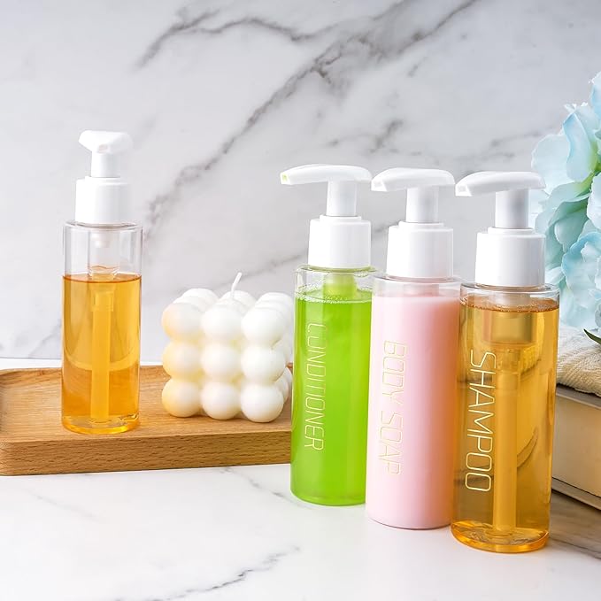 Travel Bottles Plastic Pump Bottle Dispenser Tsa Approved 3.4oz/100ml 4 Pack Refillable Shampoo and Conditioner Empty Travel Size for Cosmetic, Lotion, Liquid Soap (Clear)