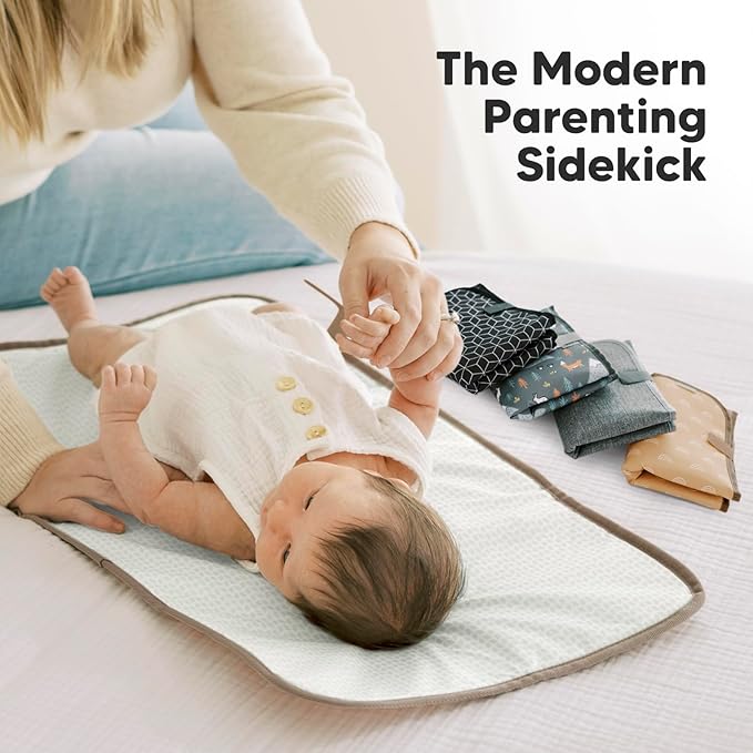 KeaBabies Portable Diaper Changing Pad, Easy Wipe Clean - Foldable Waterproof Baby Changing Mat for Diaper Bag, Compact, Lightweight, 25x13 Baby Changer Travel Essential, Machine Washable (Rainbow)