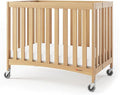 Foundations Travel Sleeper Wood Compact Folding Crib with 2” InfaPure Foam Crib Mattress and Commercial Grade Casters for Hotels, Natural