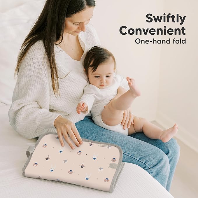 KeaBabies Portable Diaper Changing Pad, Easy Wipe Clean - Foldable Waterproof Baby Changing Mat for Diaper Bag, Compact, Lightweight, 25x13 Baby Changer Travel Essential, Machine Washable(Wild Patrol)