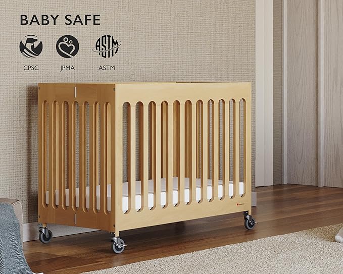 Foundations Boutique Folding Mini Baby Crib - Compact, Portable, Wooden Hotel Crib, Foldable Mini Crib for Baby & Toddlers - Includes 3" Foam Mattress, Natural