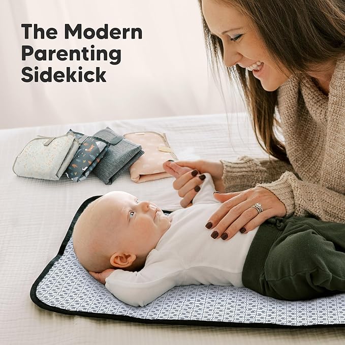 KeaBabies Portable Diaper Changing Pad, Easy Wipe Clean - Foldable Waterproof Baby Changing Mat for Diaper Bag, Compact, Lightweight, 25x13 Baby Changer Travel Essential, Machine Washable (Pixel)