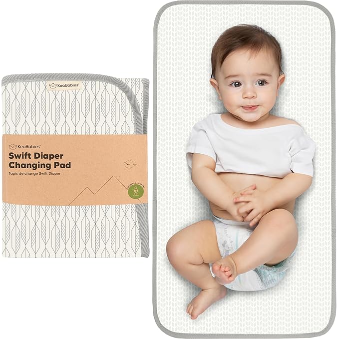 KeaBabies Portable Diaper Changing Pad, Easy Wipe Clean - Foldable Waterproof Baby Changing Mat for Diaper Bag, Compact, Lightweight, 25x13 Baby Changer Travel Essential, Machine Washable (Prism)