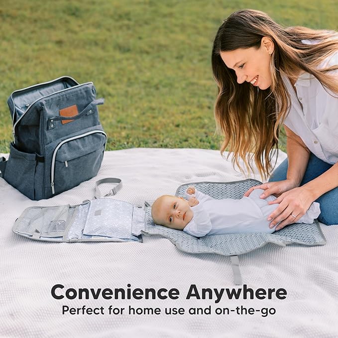 KeaBabies Portable Diaper Changing Pad - Large Waterproof Baby Changing Mat, Compact Travel Diaper Clutch, Functional Pockets Fit Newborn Essentials, Wipeable & Padded Baby Changer (Wild Patrol)