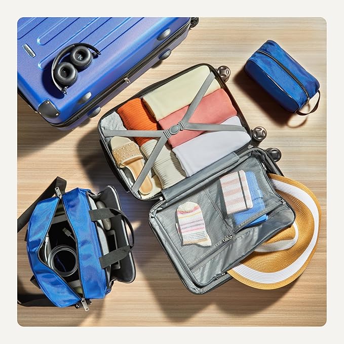 Amazon Basics 4-Piece Luggage Set, Including Two Hardside Suitcases With Multi-directional Spinner Wheels (22" Carry-On and 28" Checked), 15" Tote Bag and 10" Compact Travel Bag, Navy Blue