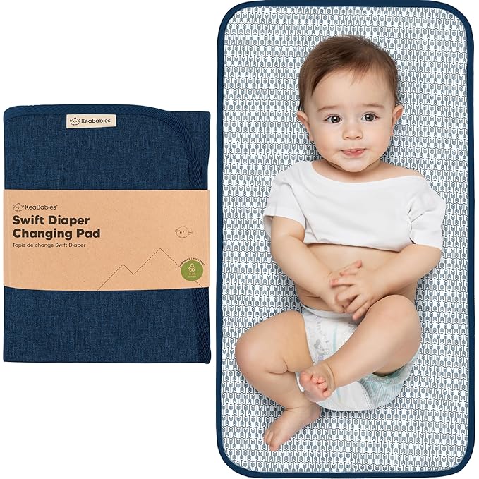 KeaBabies Portable Diaper Changing Pad, Easy Wipe Clean - Foldable Waterproof Baby Changing Mat for Diaper Bag, Compact, Lightweight, 25x13 Baby Changer Travel Essential, Machine Washable (Navy Blue)